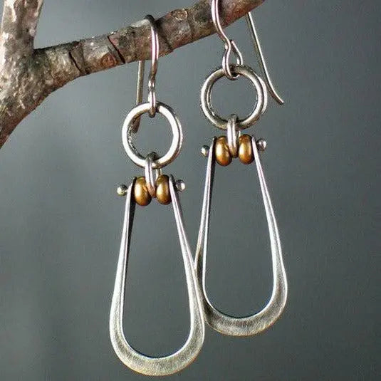 Silver earrings with vintage style pendant