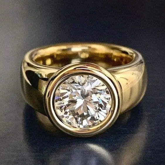 Forged gold ring with zircons in vintage style