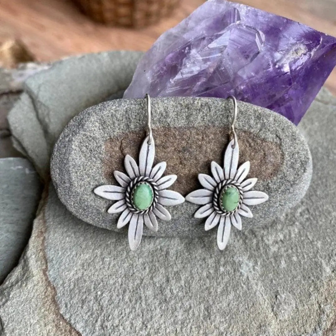 Silver lotus earrings with green stones