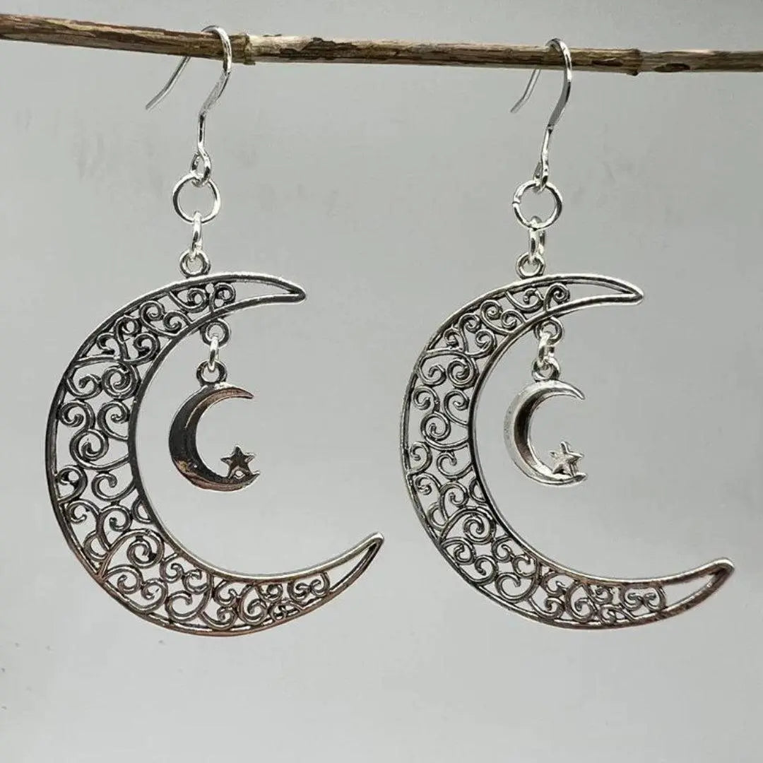 Silver earrings in the shape of the moon