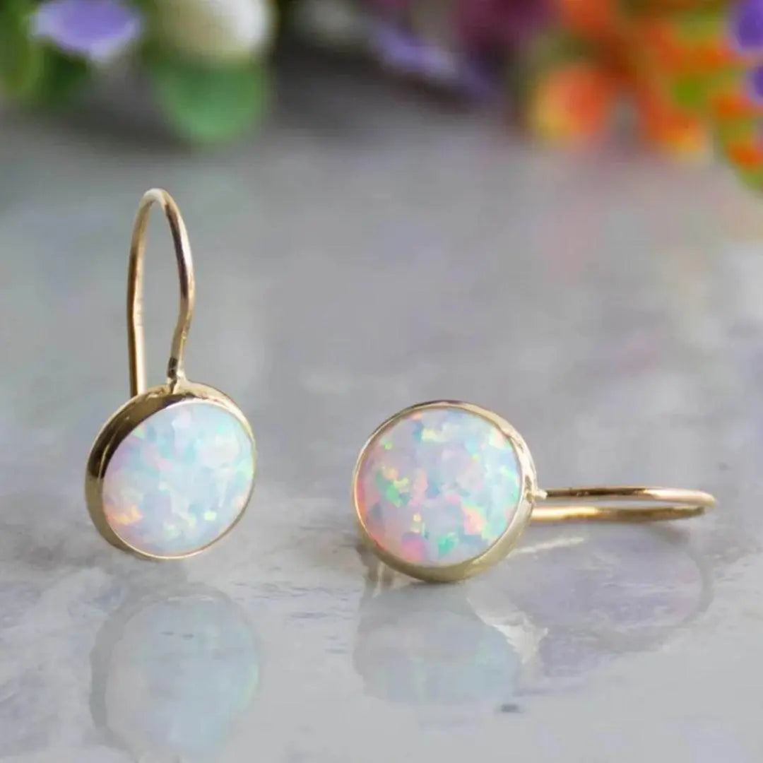 Gold-plated earrings with white opal