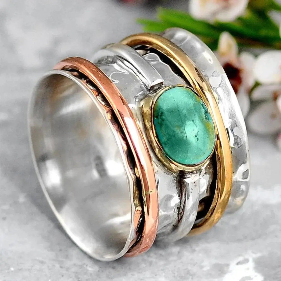 Silver and gold ring with vintage-style turquoise