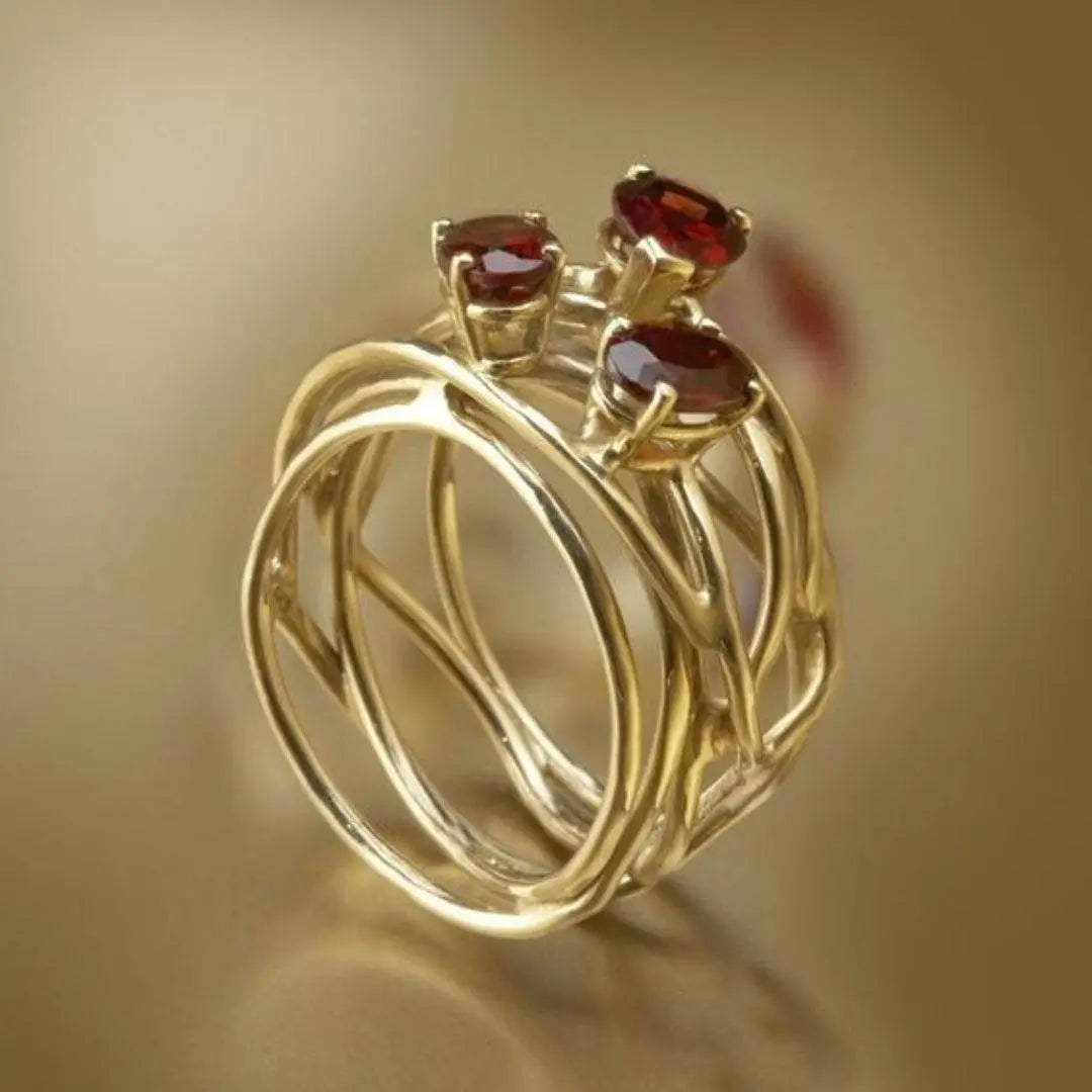 Thin vintage style ring made of red zirconia in gold