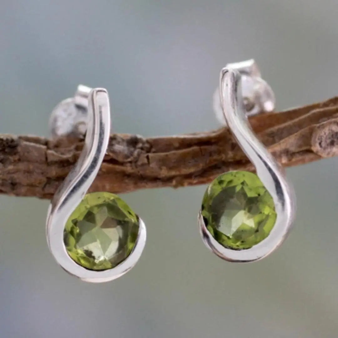 Silver earrings with olive zircons