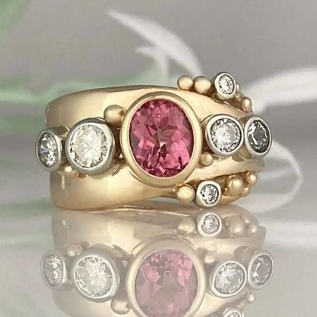Gold vintage ring with red zirconia
