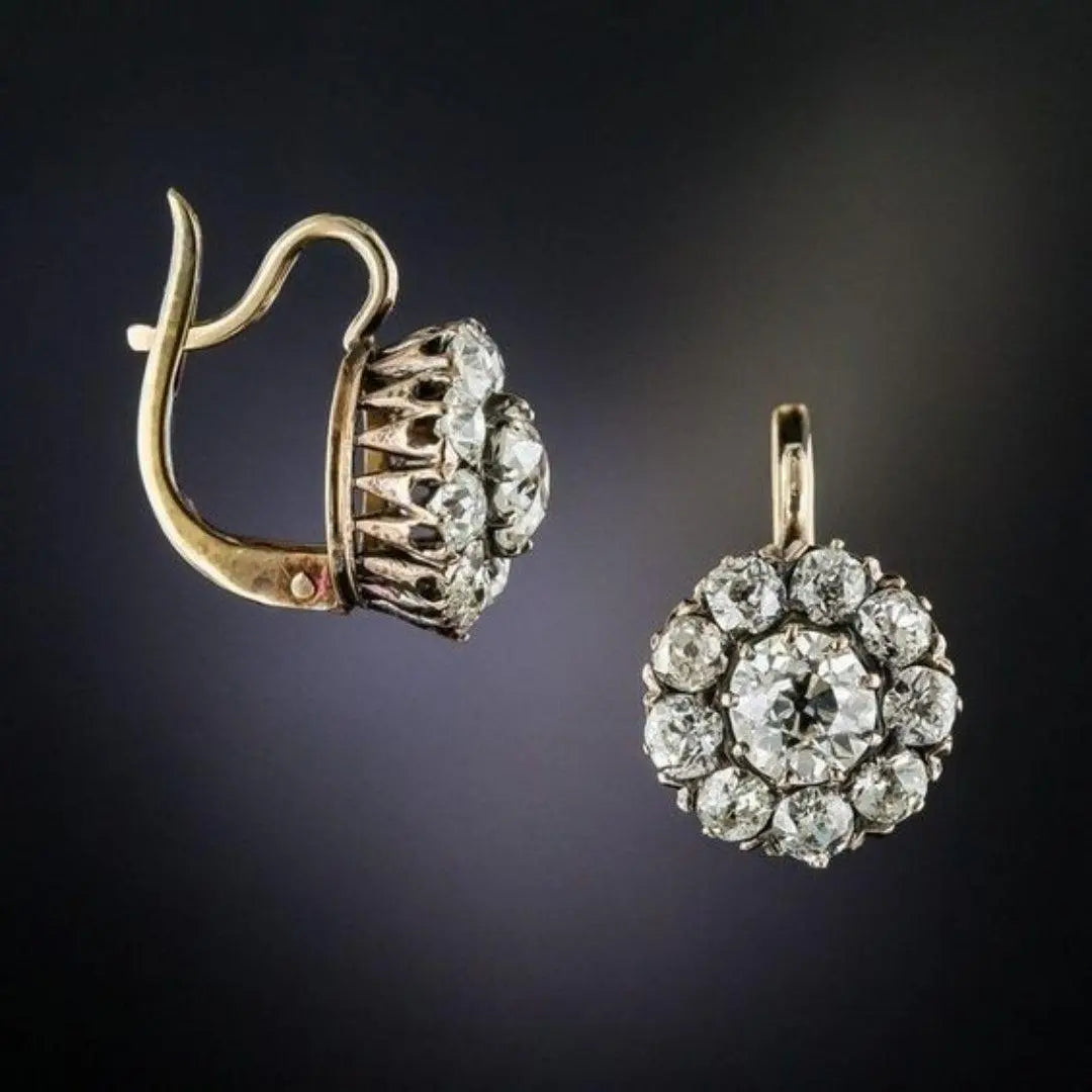 Gold earrings with precious stones
