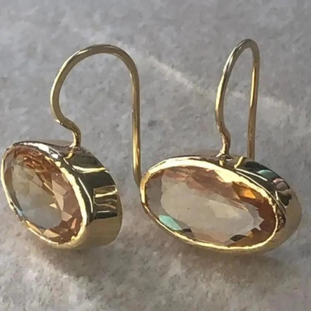 Gold earrings with crystal inserts