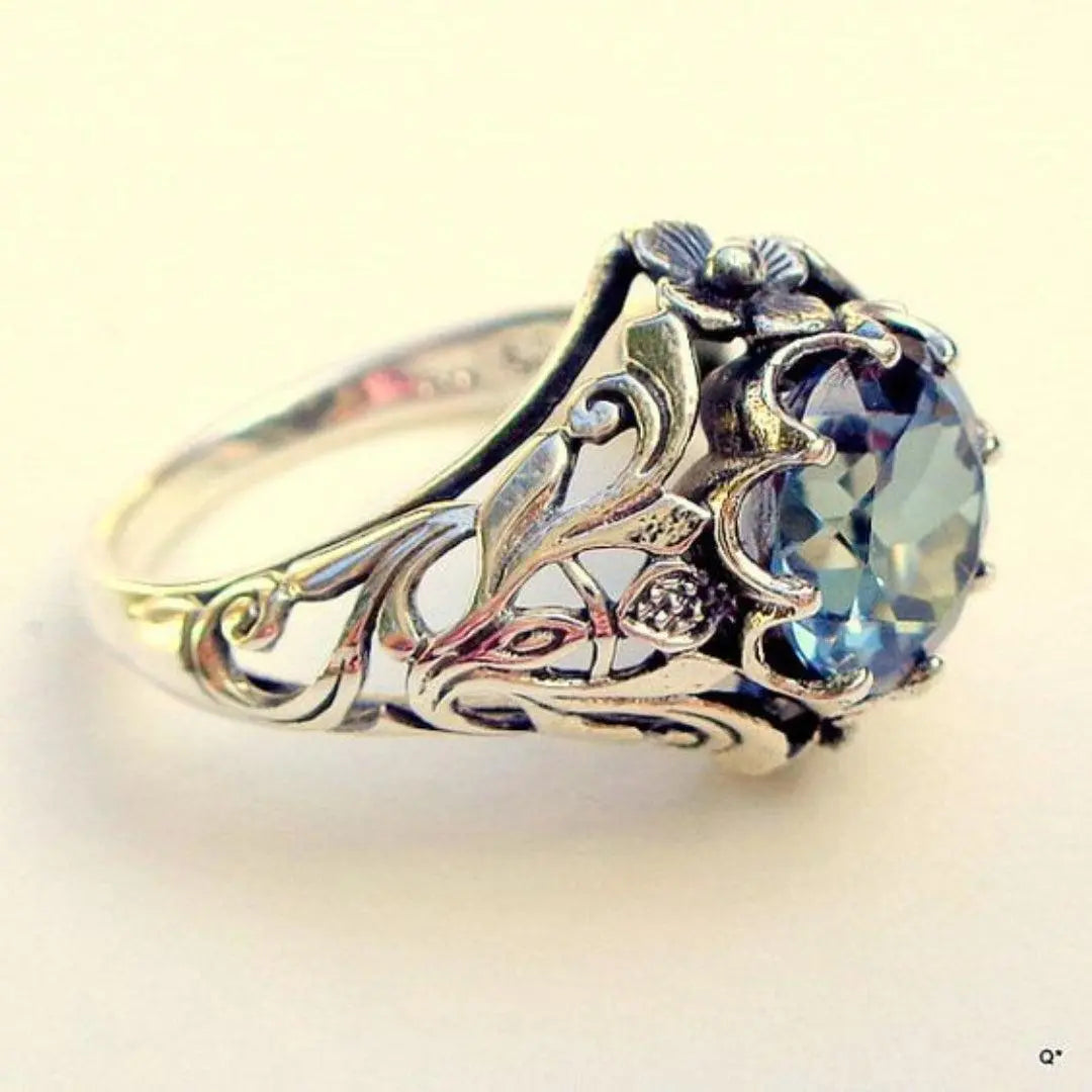 Silver ring with blue glass in vintage style