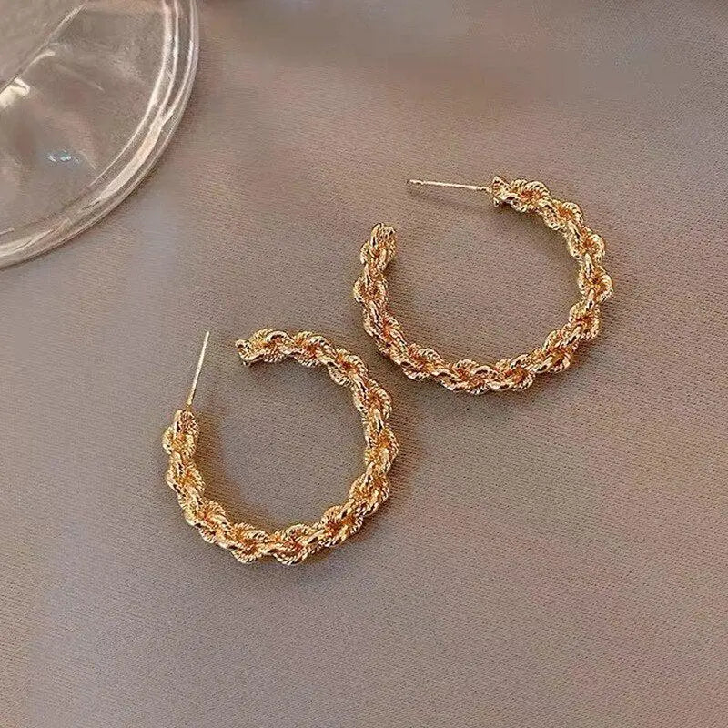 Gold and diamond earrings