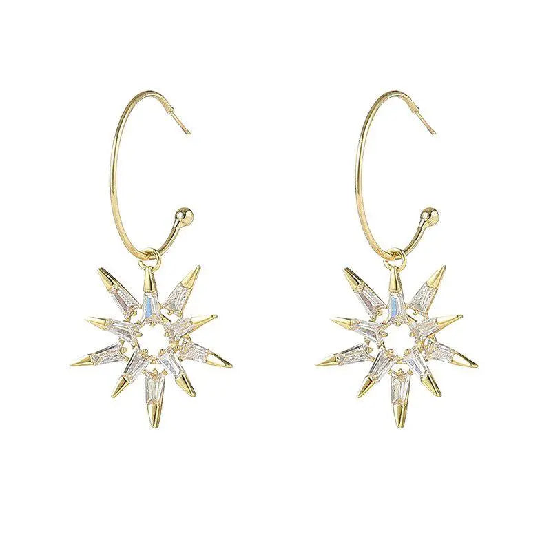 Gold and silver star earrings