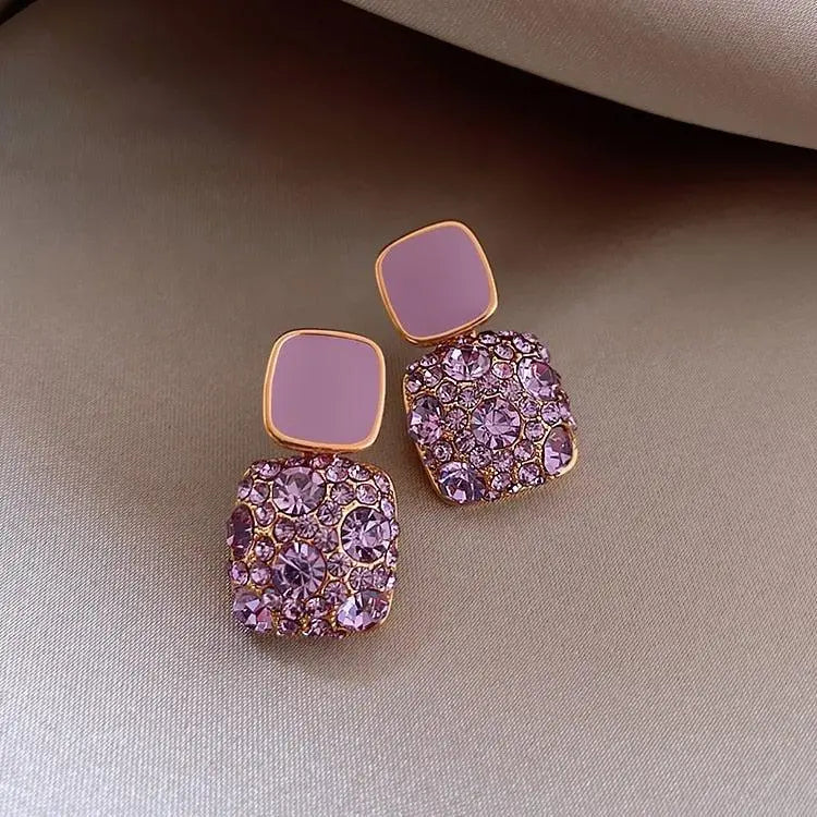 Luxury purple earrings with zircons