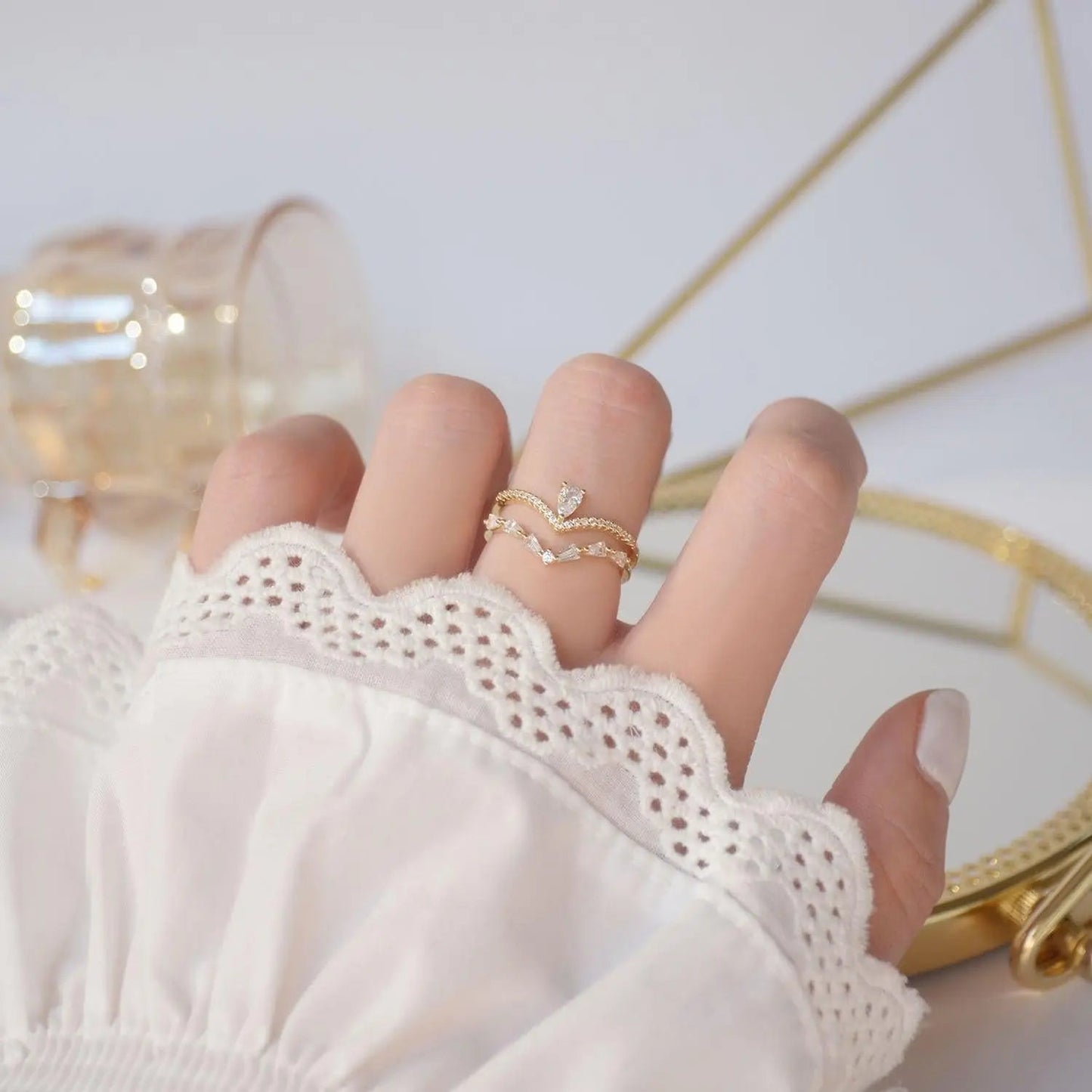 Adjustable gold zirconia ring