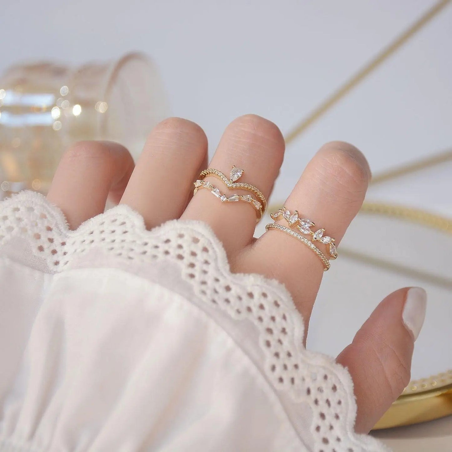 Adjustable gold zirconia ring