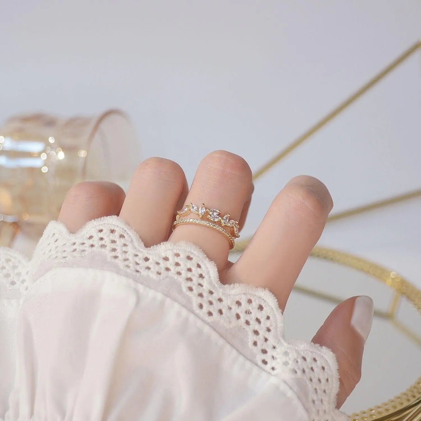 Adjustable gold zirconia ring