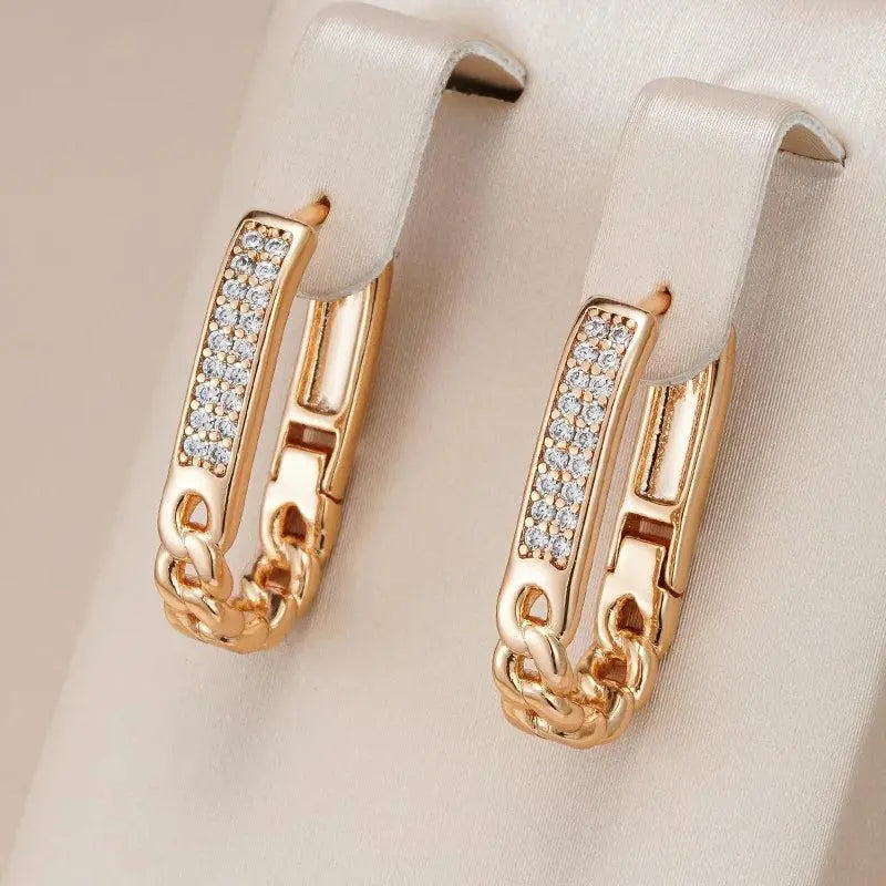 Elegant gold chain earrings with zircons