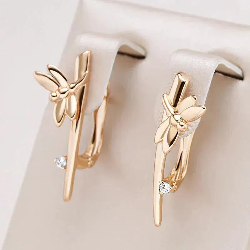 Elegant gold dragonfly earrings with zircons