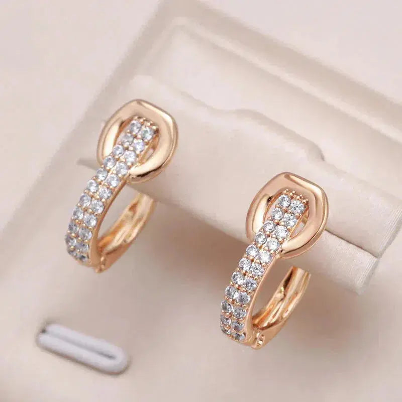 Elegant earrings with inlaid zirconia in gold color