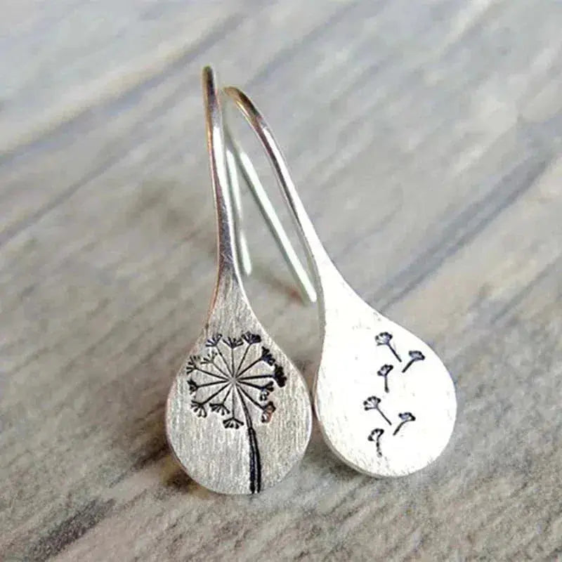 Earrings in the shape of dandelion leaves in sterling silver