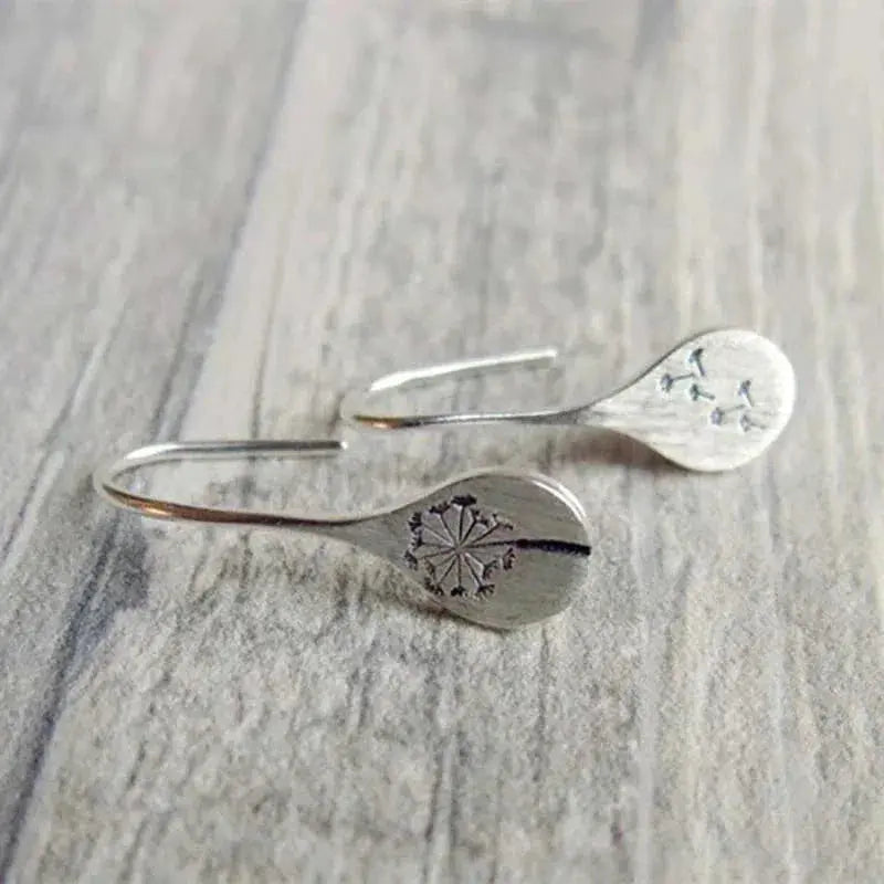 Earrings in the shape of dandelion leaves in sterling silver