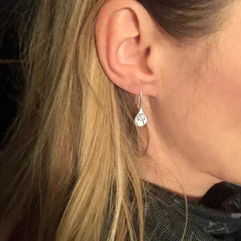 Earrings in the shape of dandelion leaves in sterling silver