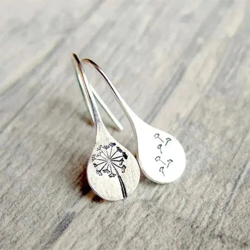 Earrings in the shape of dandelion leaves in sterling silver