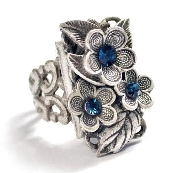 Floral ring with sapphire