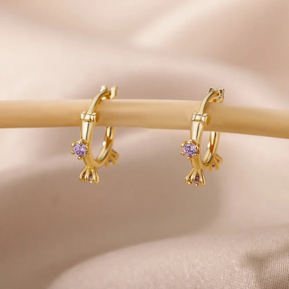 Exquisite gold-plated earrings with purple zircons