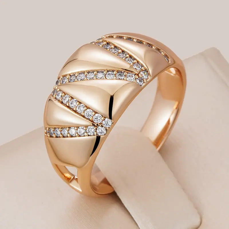 Gold colored ring with crystal inserts