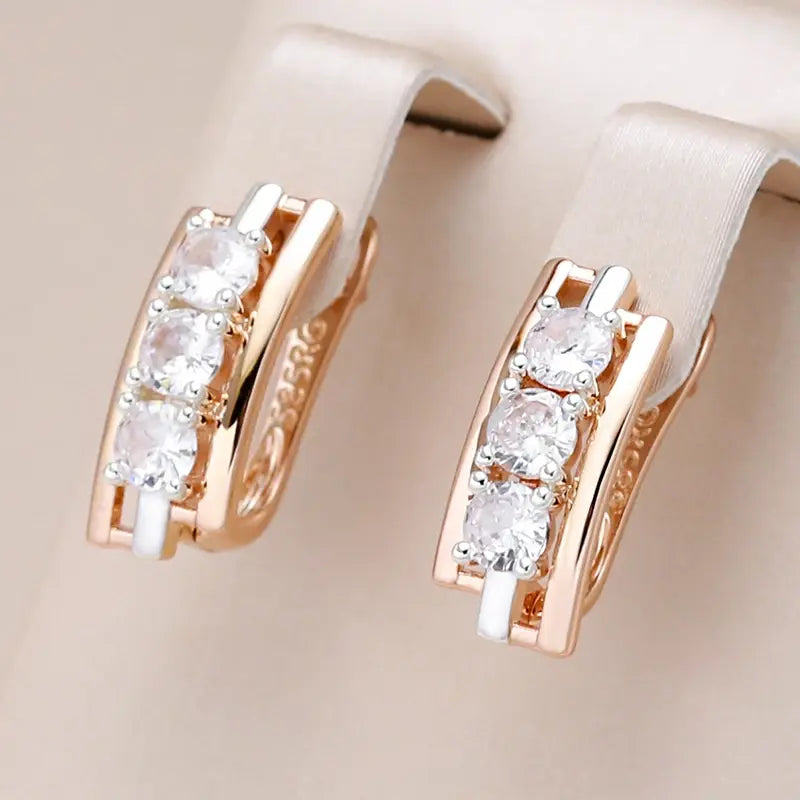 Earrings with gold-framed crystals