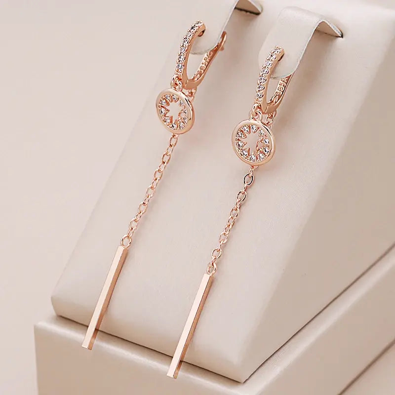 Pendant earrings with zircons