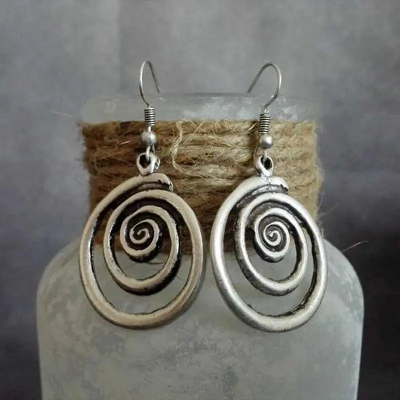Round silver earrings in vintage style