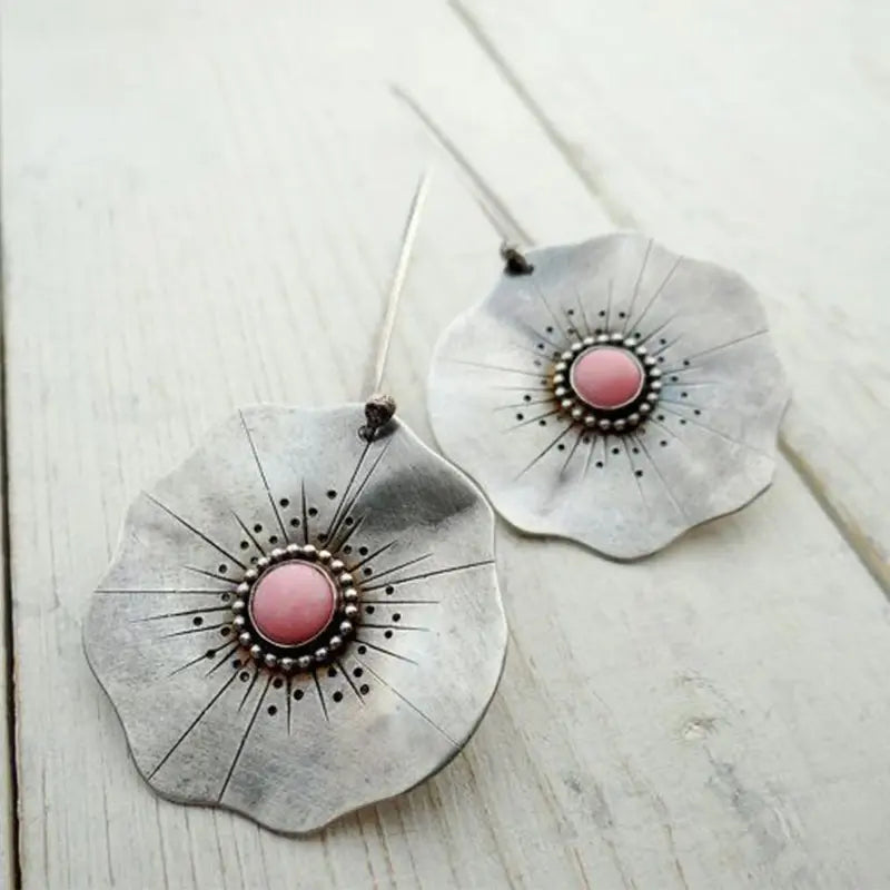 Vintage earrings with silver petals and red stone