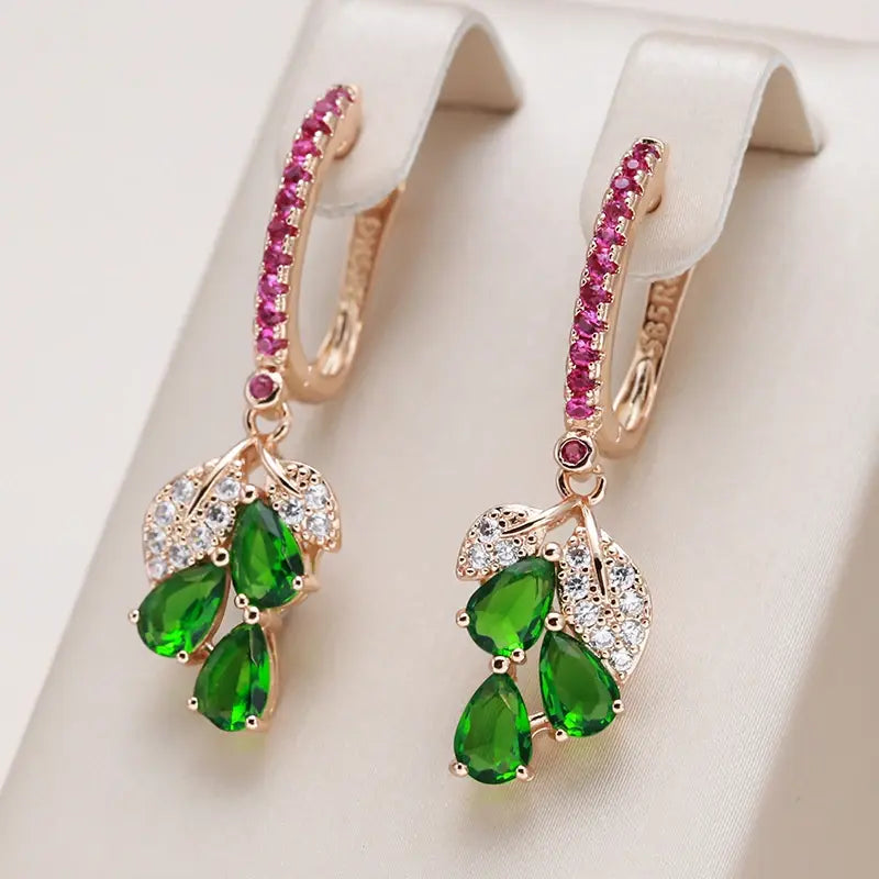 Elegant pendant earrings with colored zircons