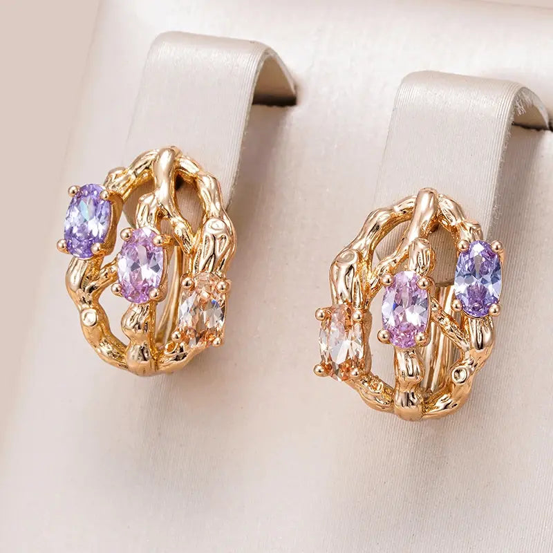 Exotic, elegant earrings made of gold and colored stones