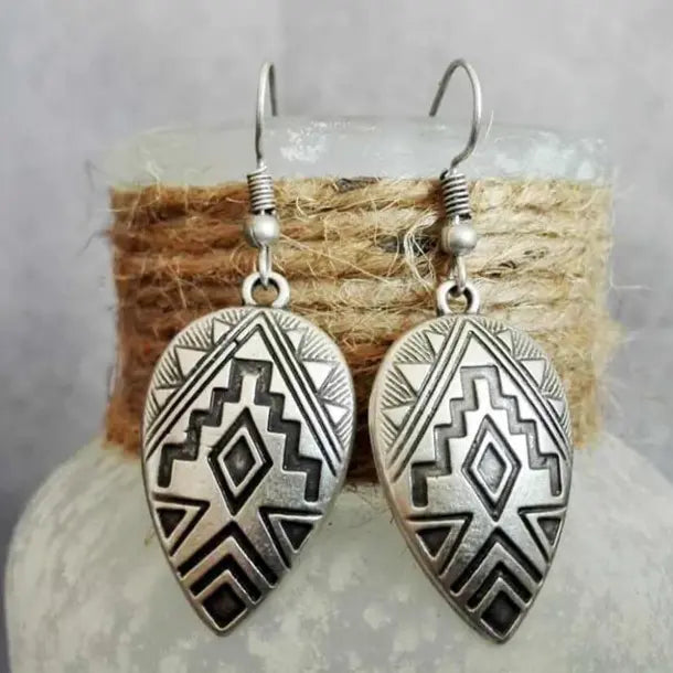 Silver earrings in ethno style