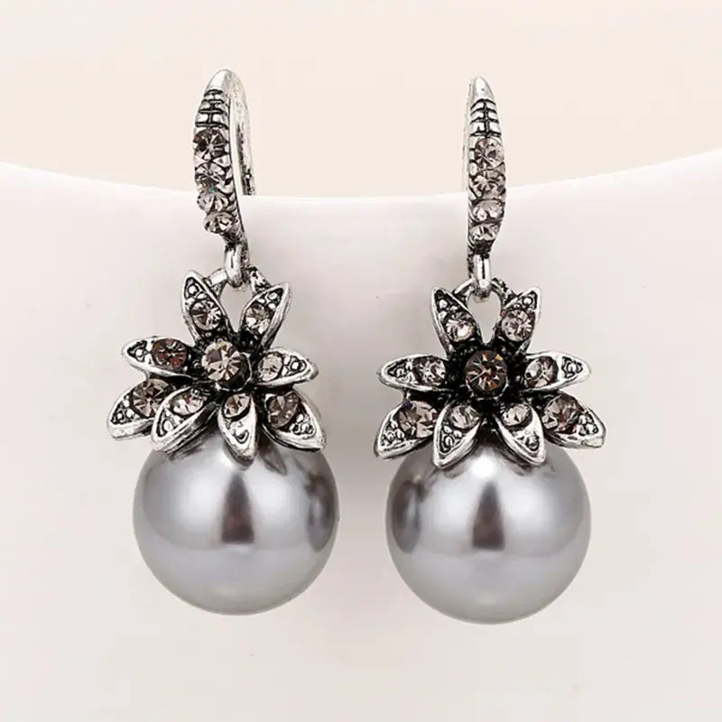 Silver earrings with pearls in vintage style