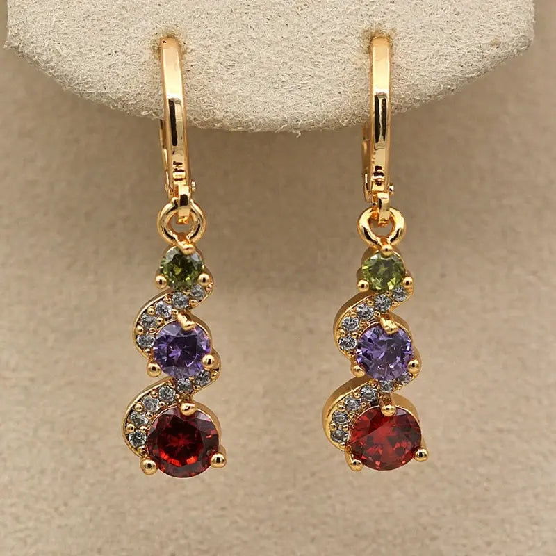 Elegant earrings with gold zircons