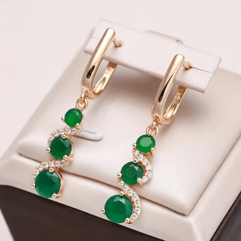 Elegant earrings with gold zircons