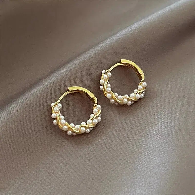 Elegant round earrings with pearls and inlay