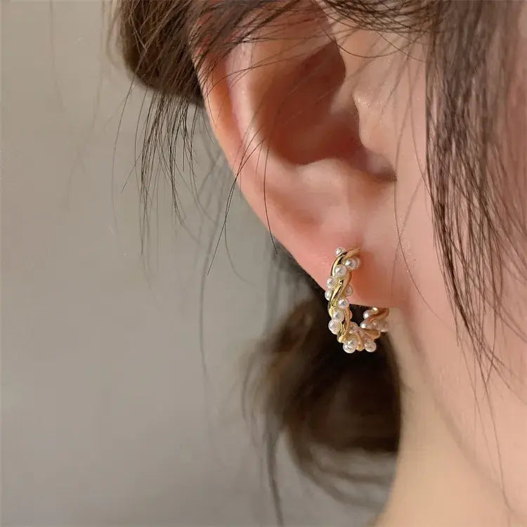 Elegant round earrings with pearls and inlay