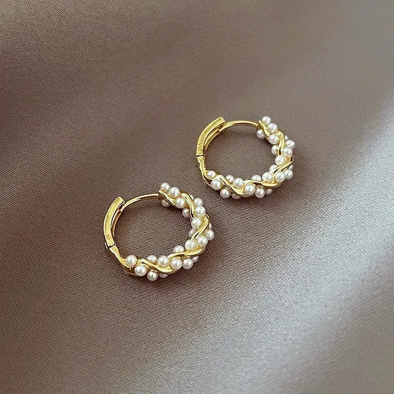 Elegant round earrings with pearls and inlay