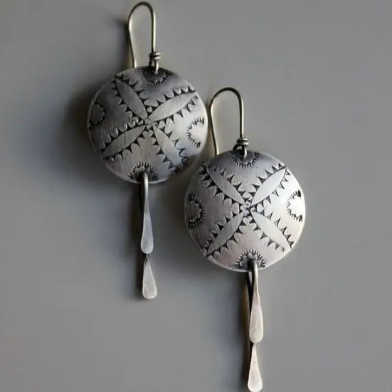 Round silver earrings in vintage style