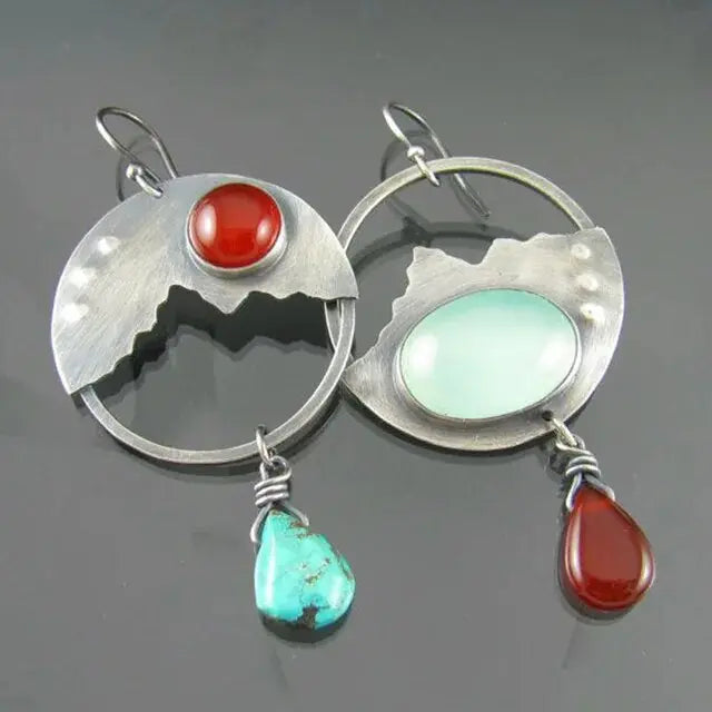 Vintage style earrings with landscape motifs in silver