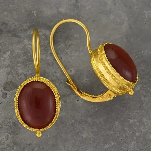 Red gold earrings in vintage style