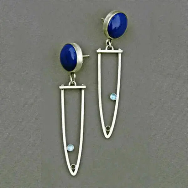 Silver earrings with blue stone