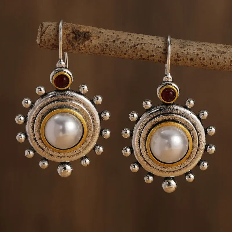 Vintage style pearl earrings with silver and gold inserts