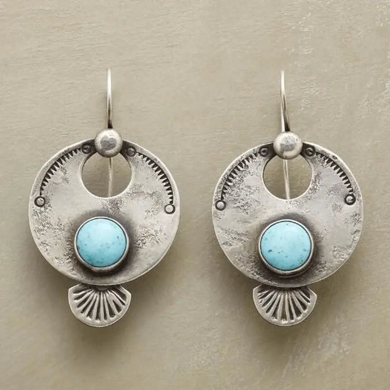 Vintage style earrings with round turquoise stones