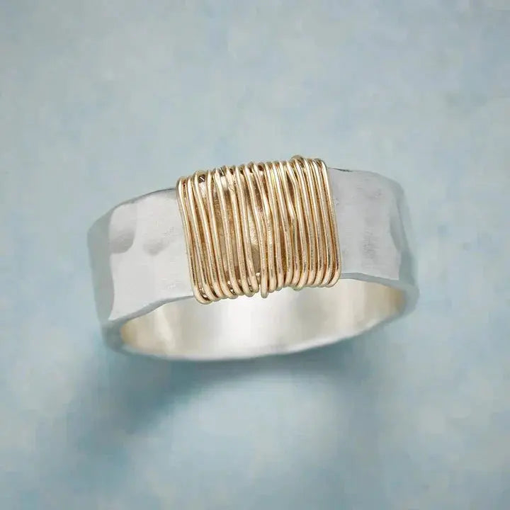 Silver ring with gold thread
