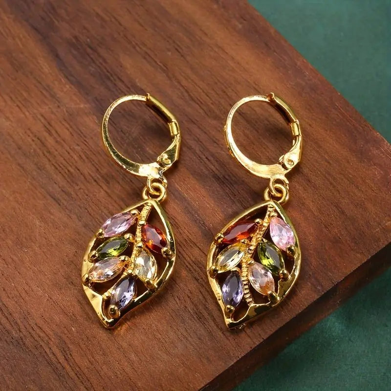 Gold vintage style earrings with colored zircons