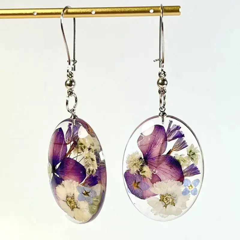 Flower-shaped earrings with crystals in sterling silver